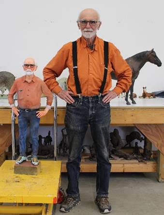 Joe Fafard in front of his work